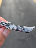A 2 inch shaped katana pin with the word 'Southside' on the blade